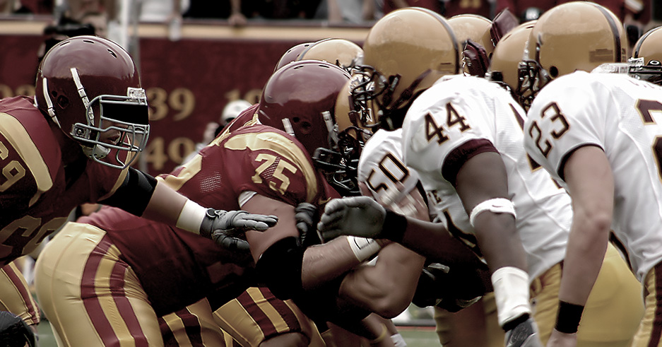 Football players in action on the field, representing the excitement of gameday